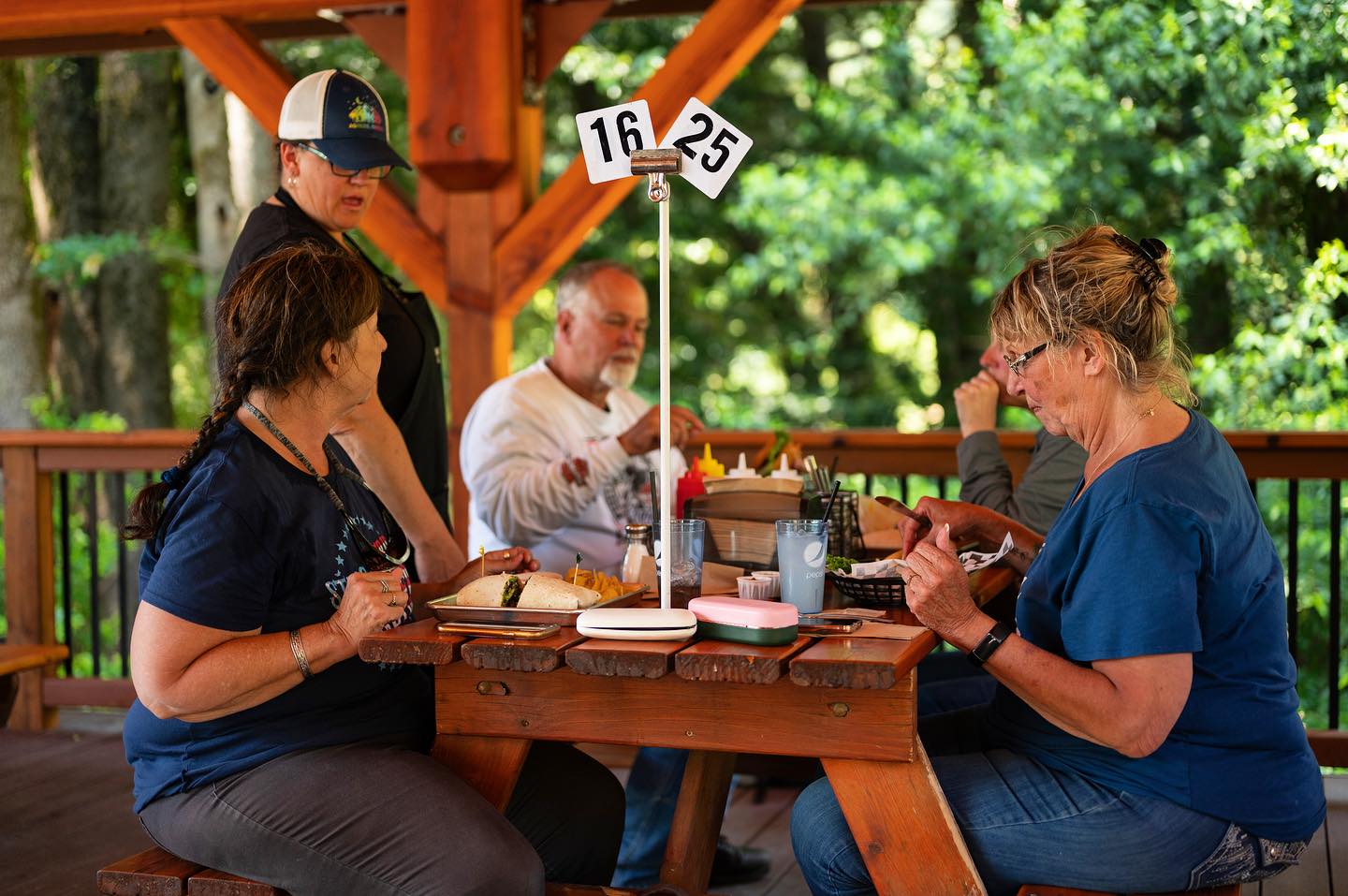 People dining at Cougar Lane Lodge in Agness, Oregon