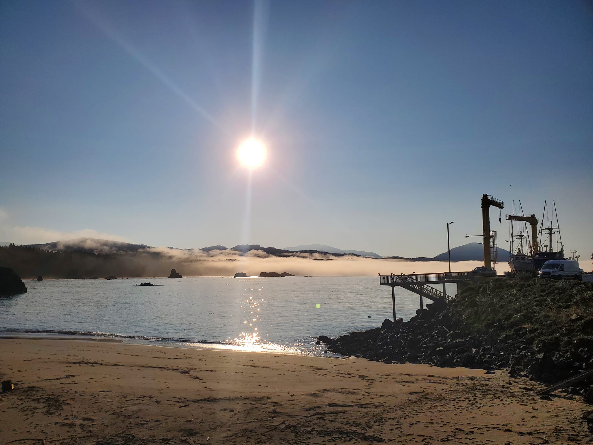 Low fog on the horizon at the Port of Port Orford, Oregon