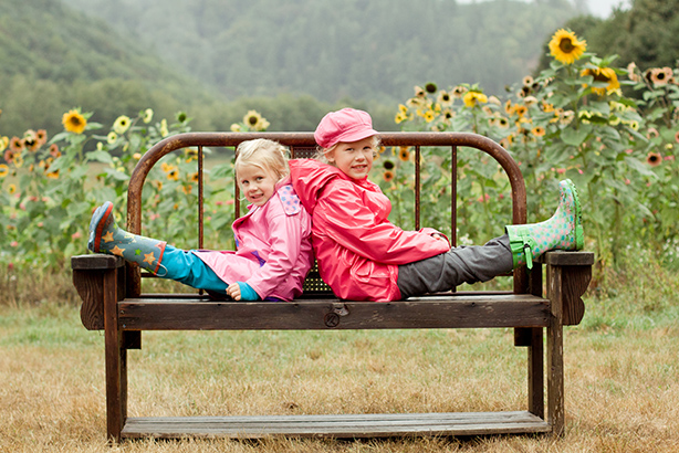 Two girls on a bench at Mahaffy Ranch near Coos Bay, Oregon