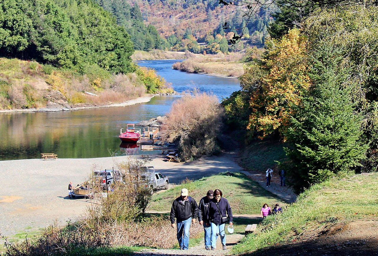 People arriving via Jerry's Rogue Jet Boats at Cougar Lane Lodge in Agness, Oregon