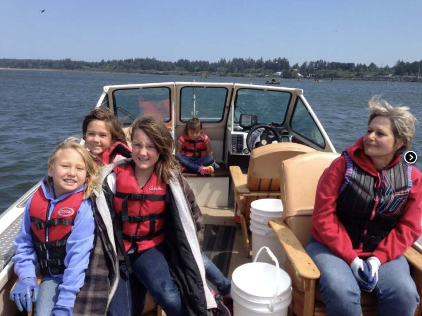 Family on a fishing boat with Fish Oregon Guide Service in Bandon, Oregon