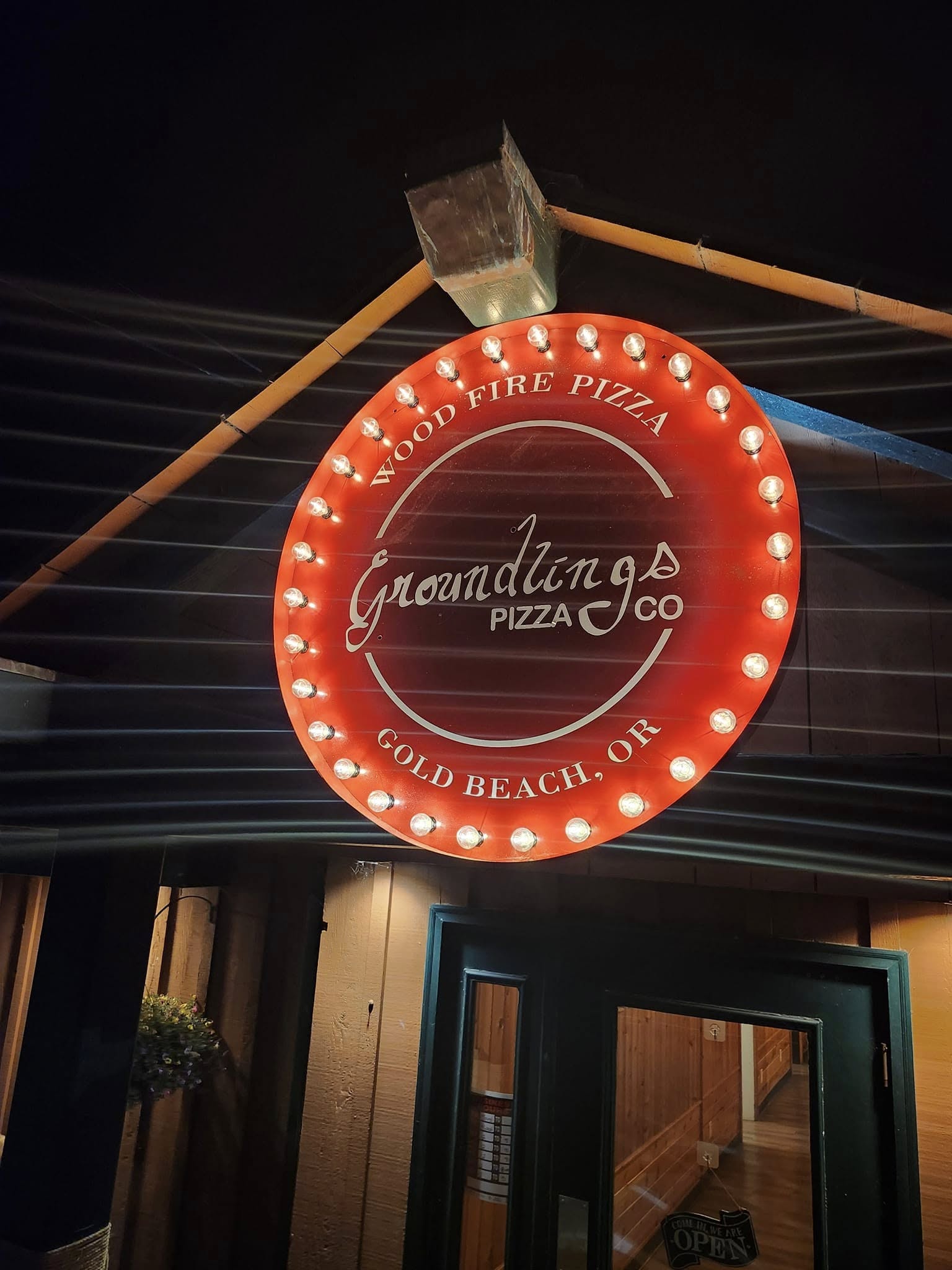 Sign at Groundlings Pizza Co. in Gold Beach, Oregon