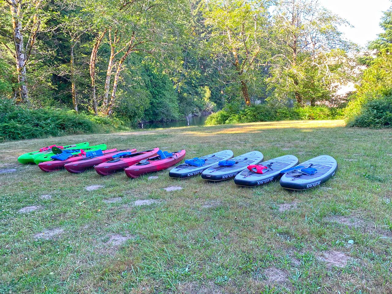 Kayaks and SUPs at Hall Lake in Lakeside, Oregon