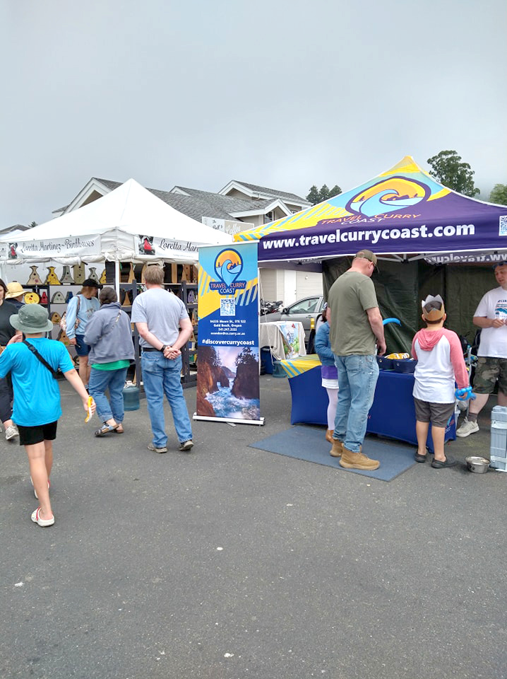 People in attendance at the Art on the Coast Festival in Brookings, Oregon