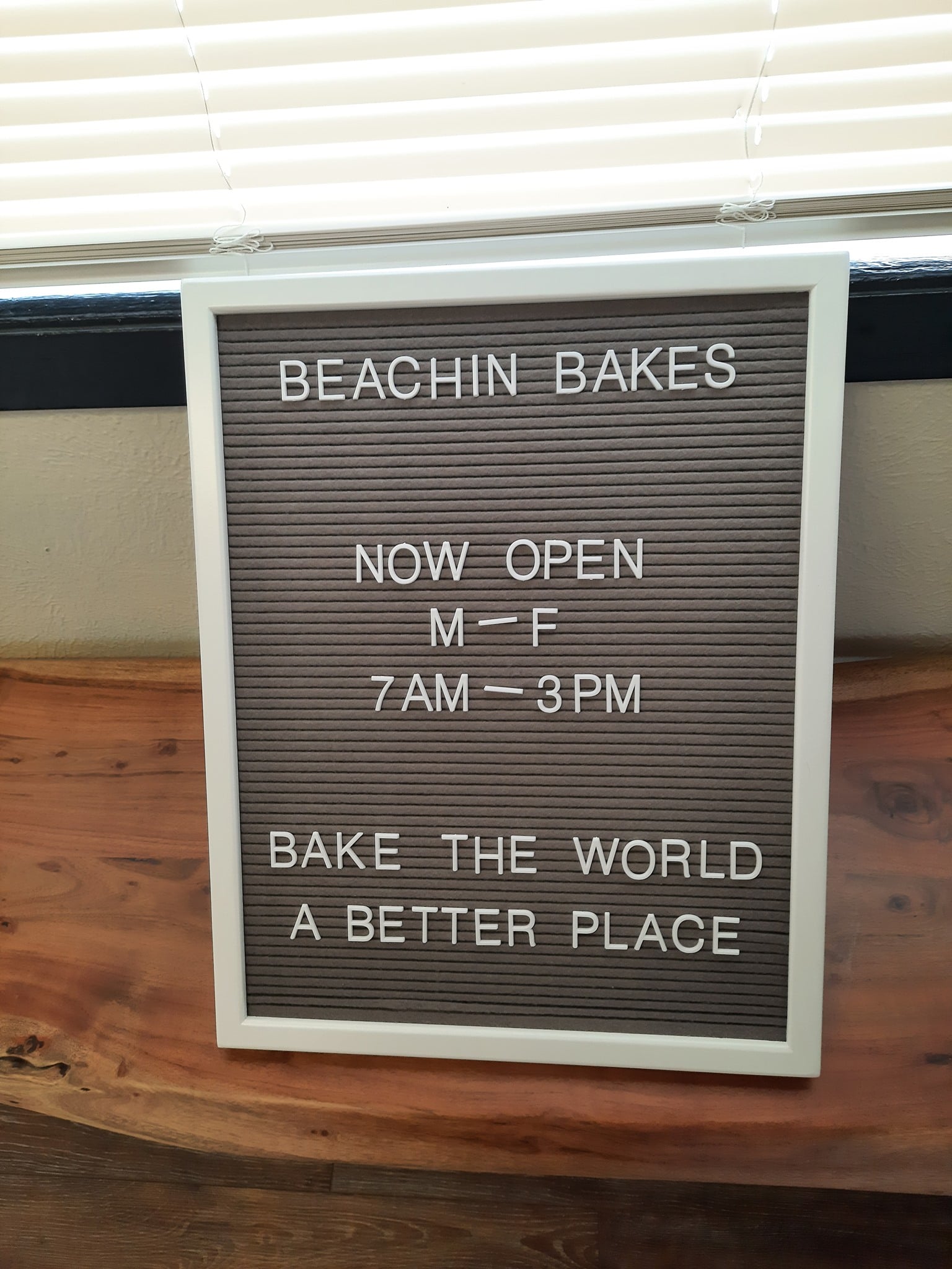 Beachin Bakes hours sign.jpg