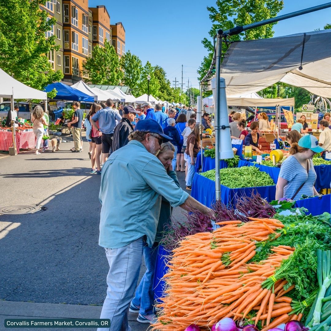 A crowd of shoppers at the Corvallis Farmers Market in Corvallis, OR