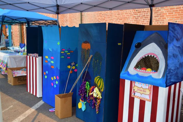 Kids activities (go fish-style games) at Beer & Brats Music Festival and Street Fair