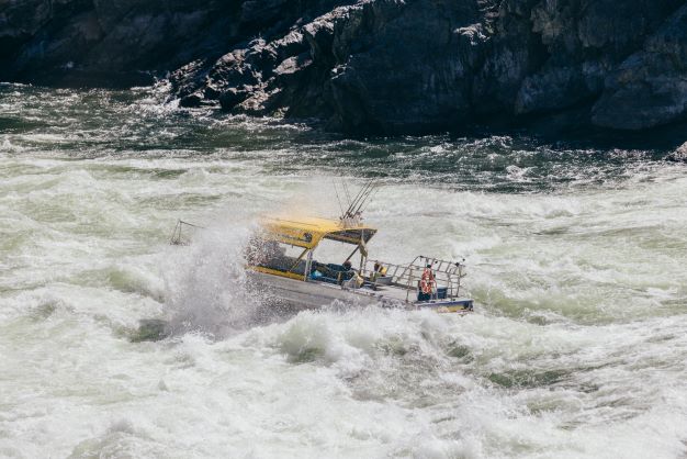 jet boat in the middle of the snake river