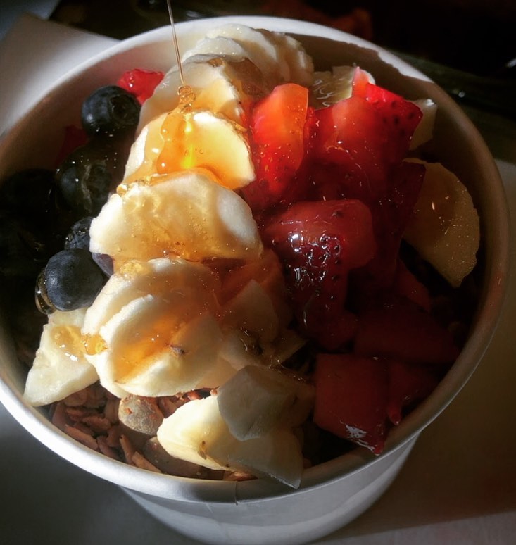 smoothie bowl with bananas, strawberries and blueberries