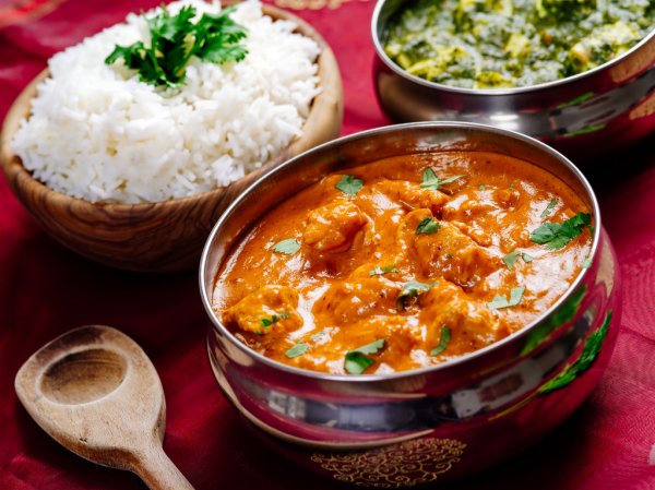 Butter chicken with rice stock photo