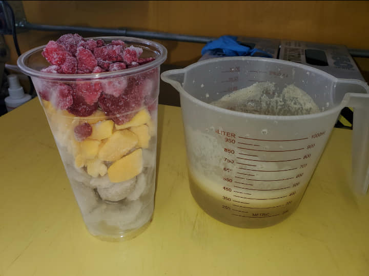measuring cup and ingredients for smoothie