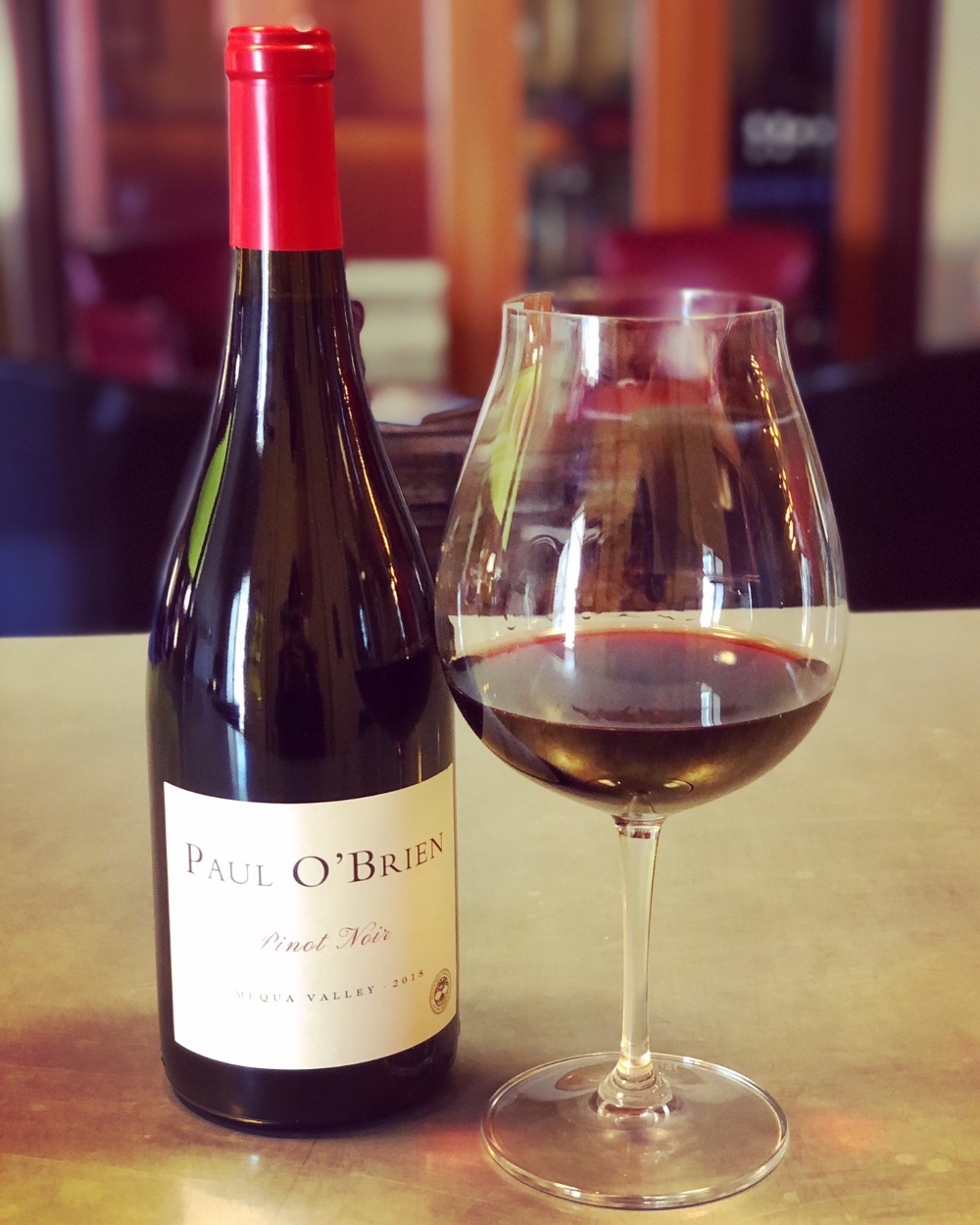 Wine glass filled with Paul O'Brien Pinot Noir