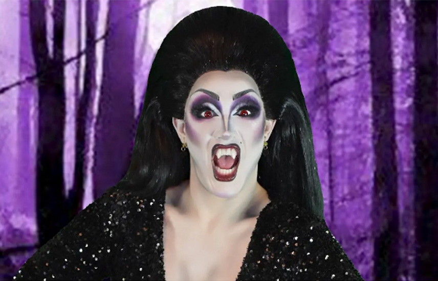 A drag queen dressed up as a vampire.