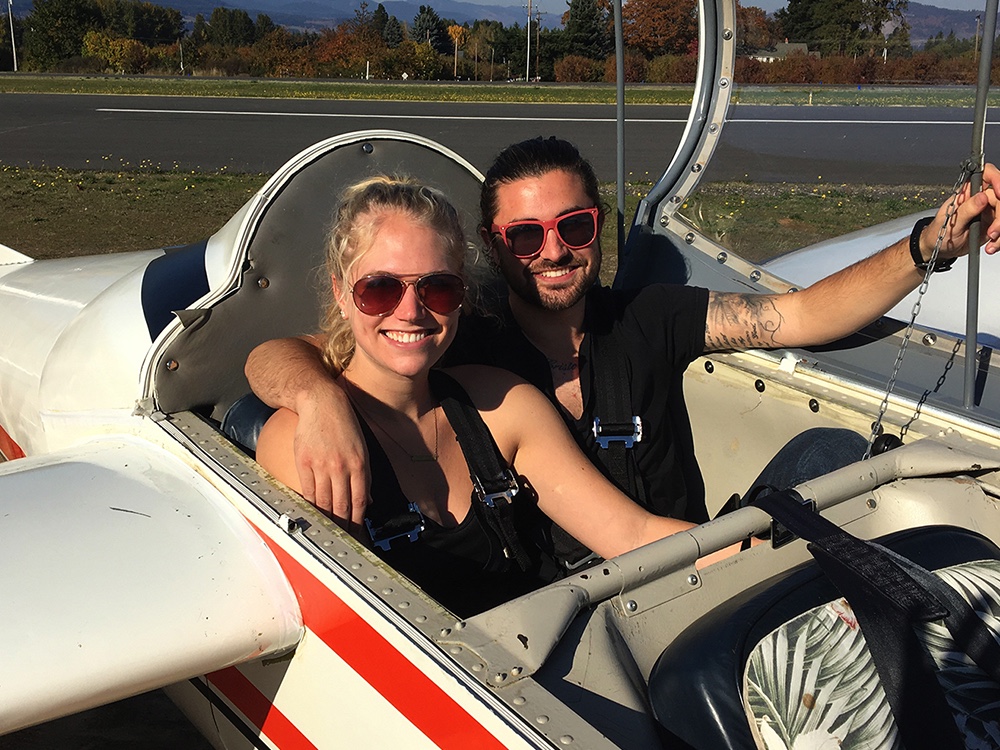 two people in cockpit of a glider