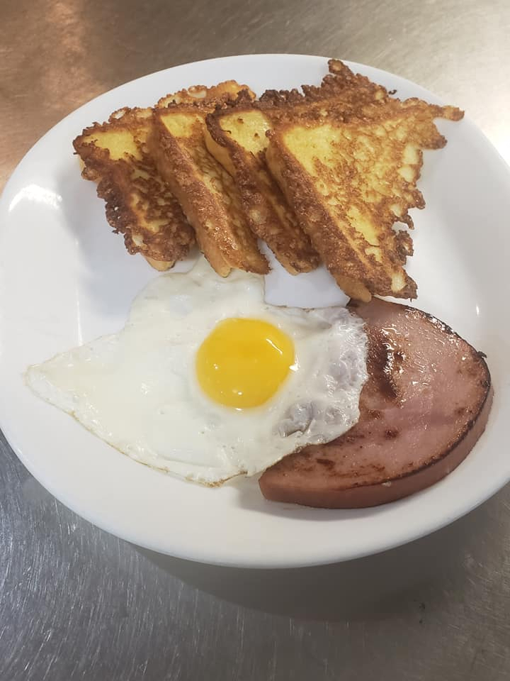 Egg, ham, and 4 French toast slices