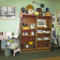 museum display of household items from Old West