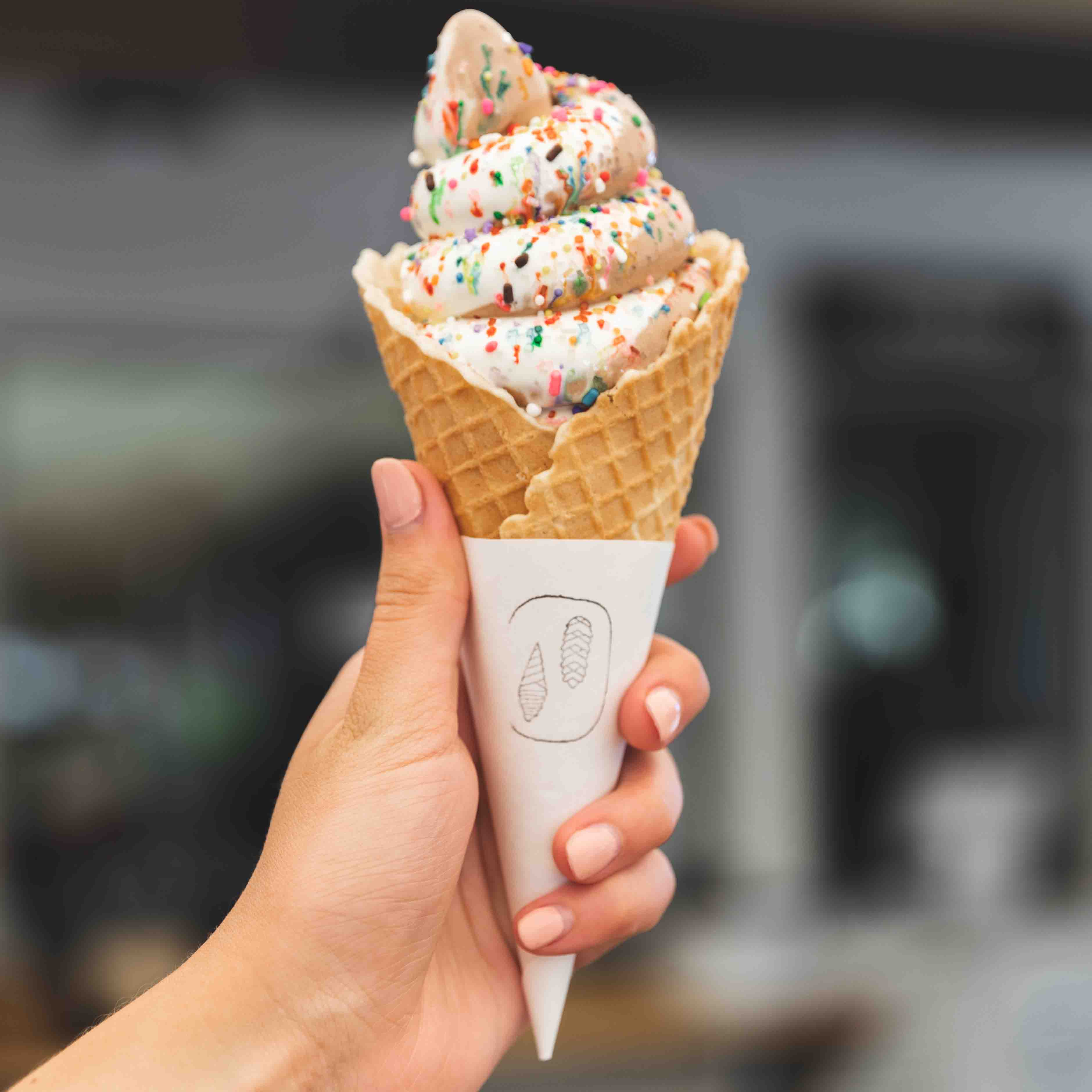 swirl ice cream cone with sprinkles