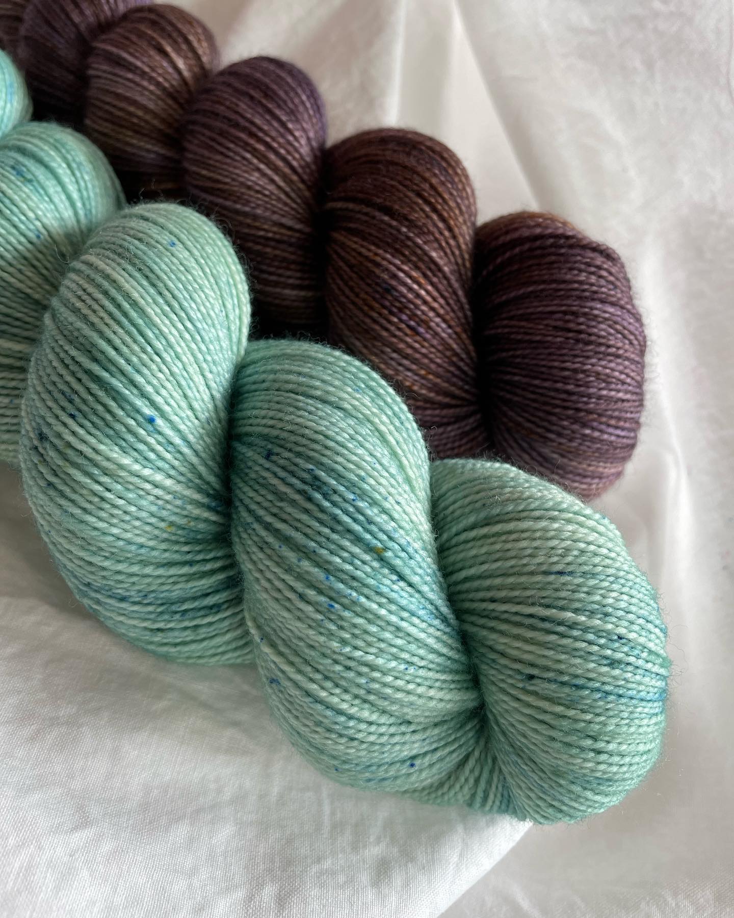 two yarn twists: purple and blue