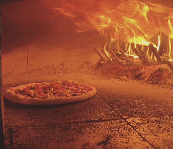 pizza in fire oven
