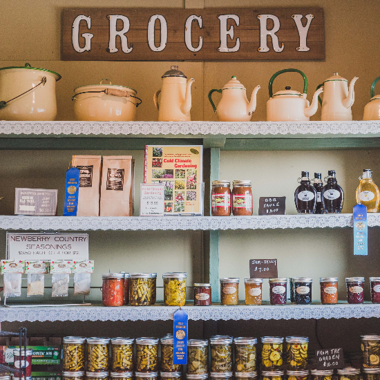 picture of inside L & S grocery store with vintage pottery and award wining jams, jellies and pickles
