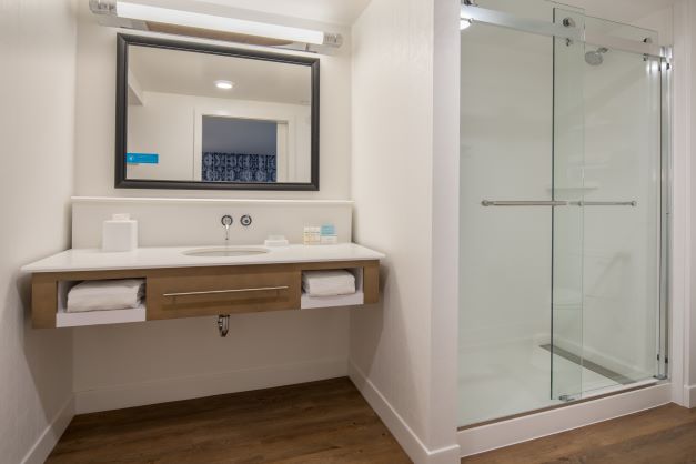 hotel bathroom with stand up shower