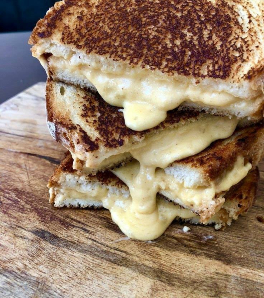 A close up picture of a grilled cheese.