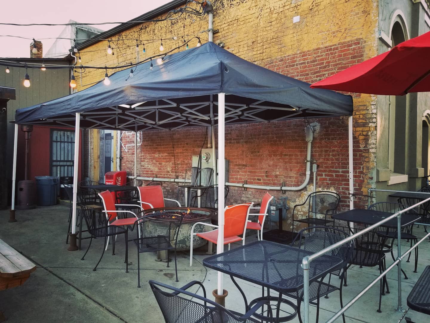 Outdoor patio seating at Brew Coffee & Tap House.