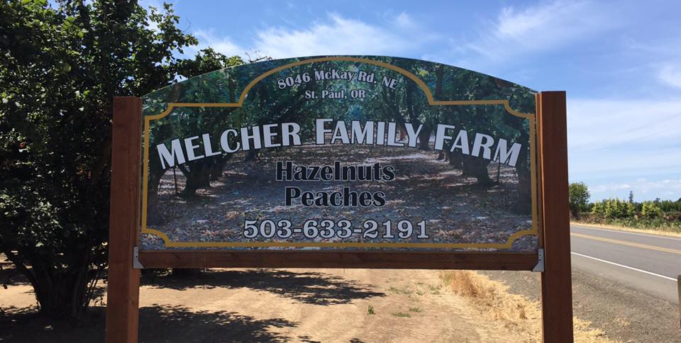Roadside sign at Ken and June's Hazelnuts at Melcher Family Farm.