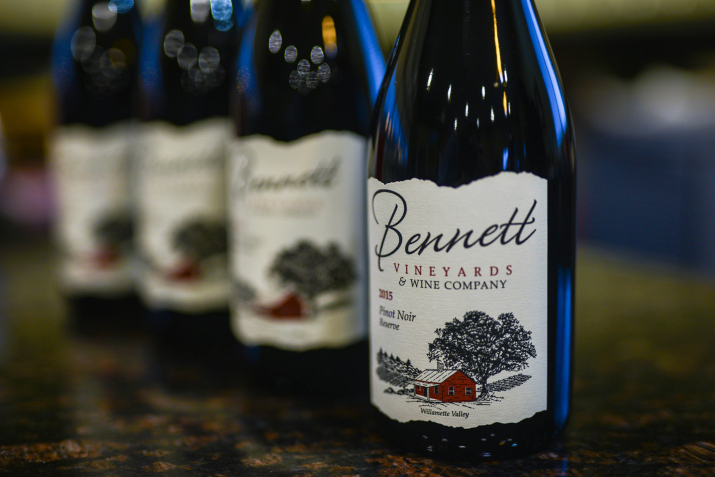 Four bottles of Bennett Vineyards wined lined up in a diagonal pattern