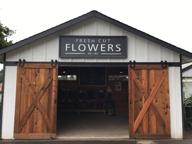 A barn that sells flowers inside