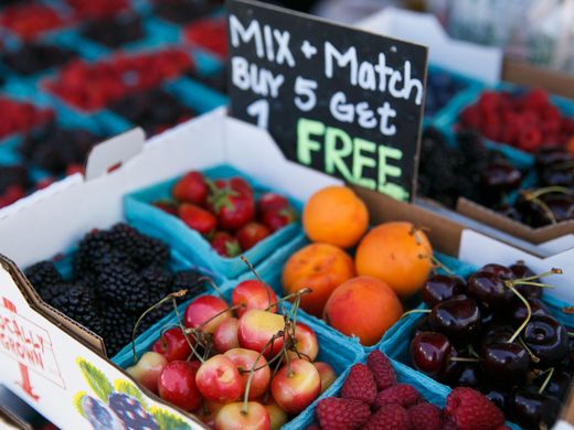 Raspberries and other fruit for sale.