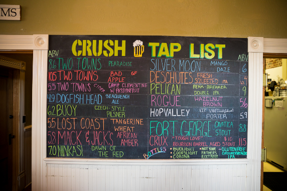Tap list at Crush Wine Bar.