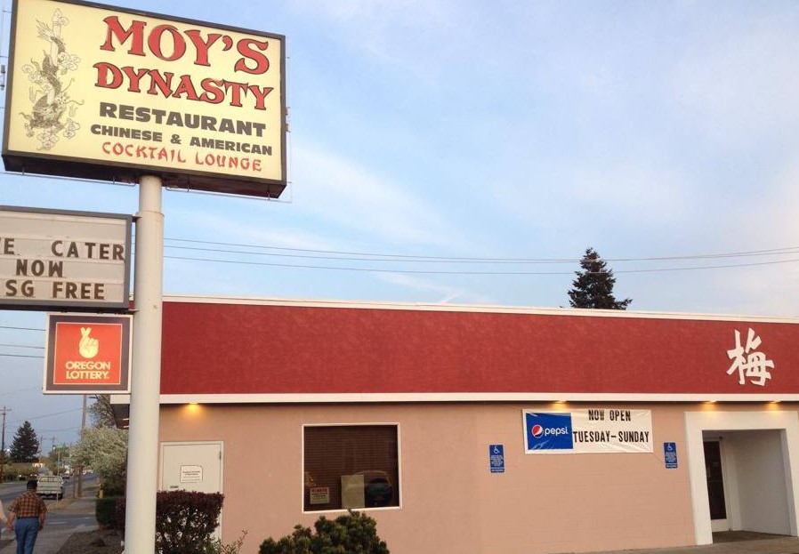 exterior of one story building with sign for Moy's Dynasty Restaurant