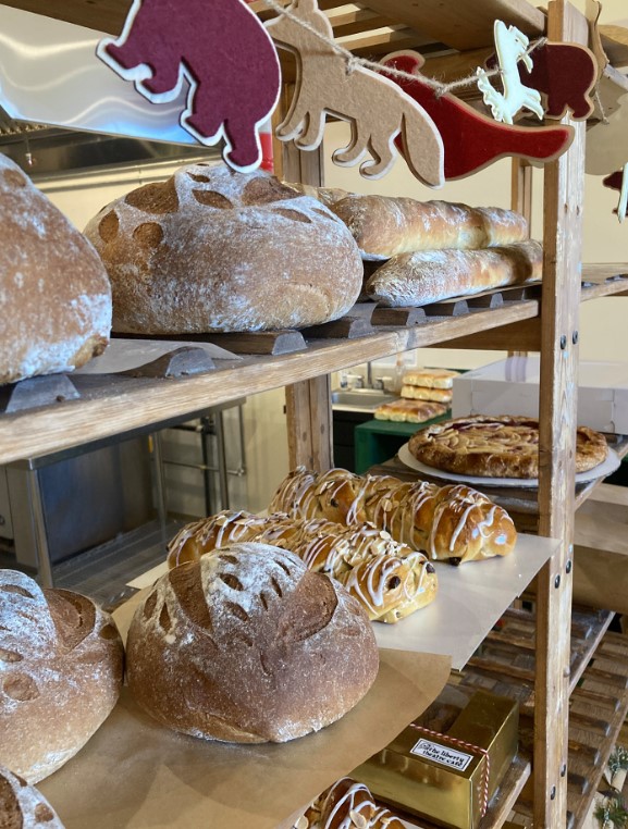 shelf of freshly baked breads