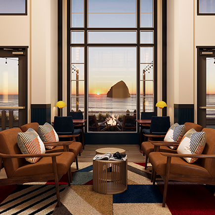 Inn at Cape Kiwanda lobby with sun setting out the window Pacific City