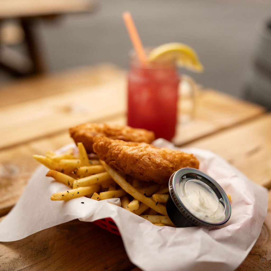 Squatchsami outpost local lingcod fish and chips with outdoor seating.jpg