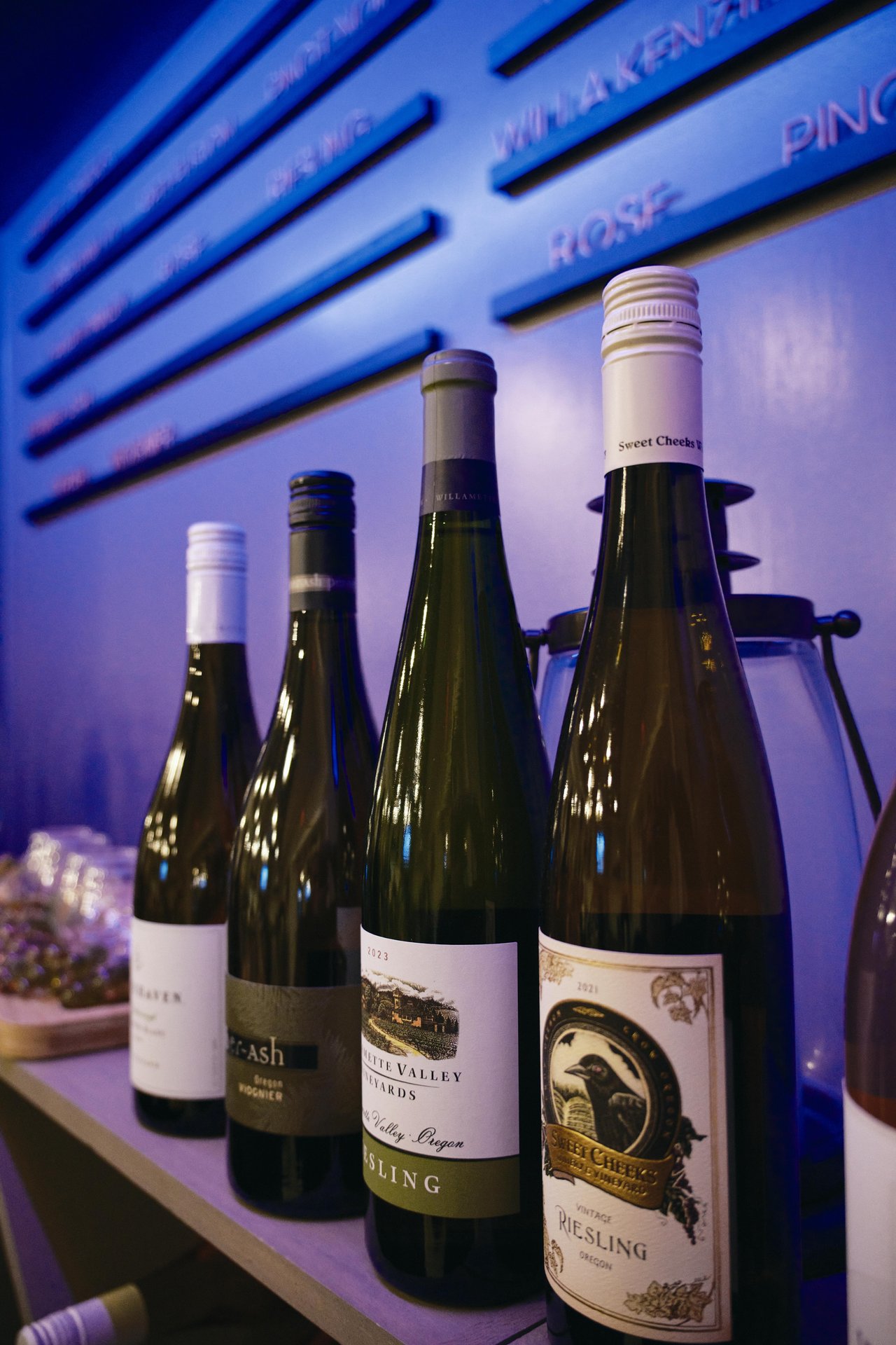 Closeup of wine bottles on shelf