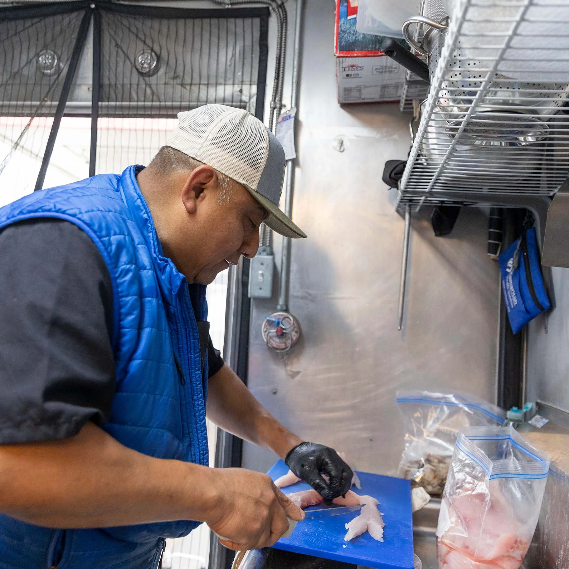 Sal de Mar Owner and Chef Chef Enrique Sanchez-Rodriguez prepares rockfish.jpg
