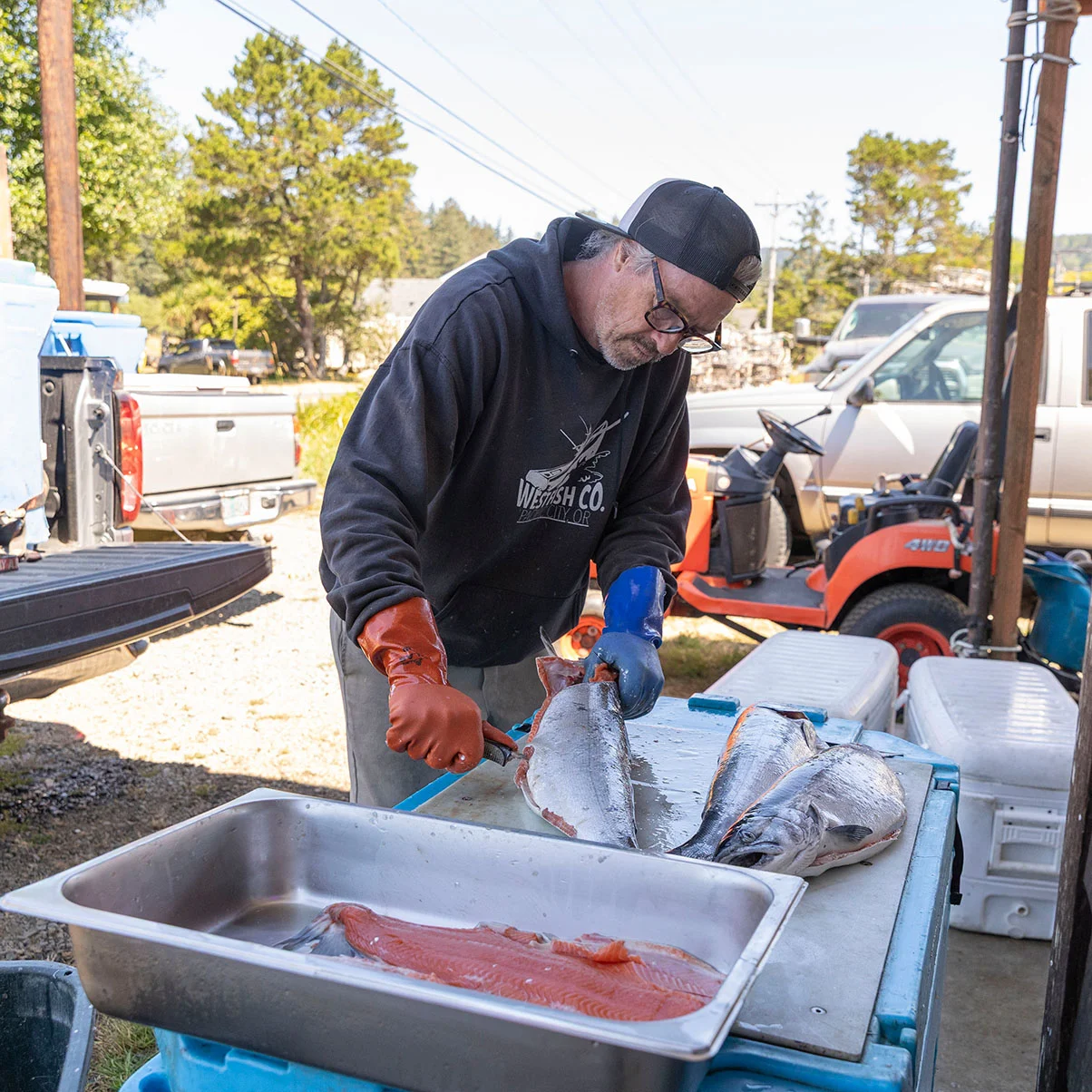 Salmon filleting at the West Fish Co. seafood marketjpg.jpg