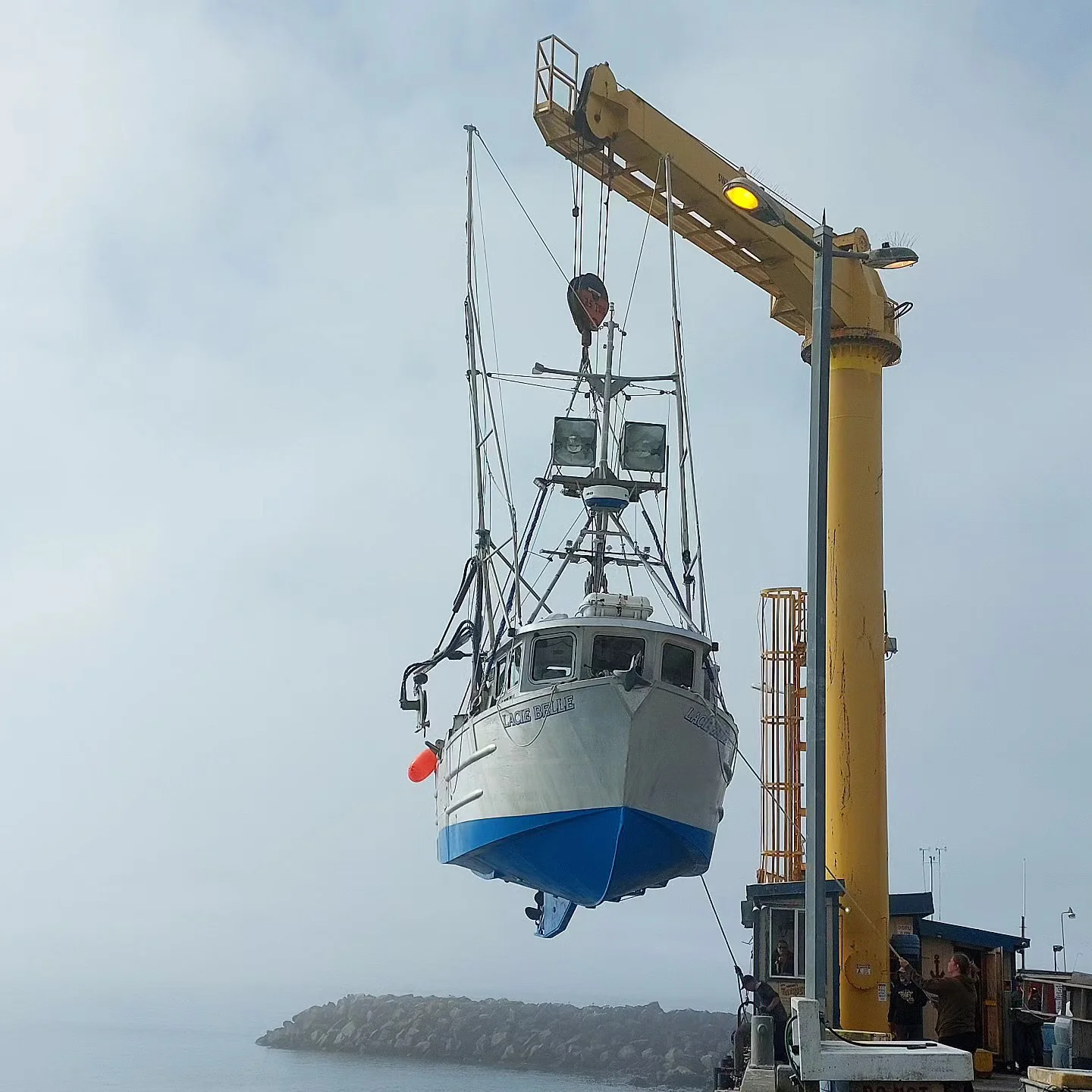 The crane used to lift fishing boats in and out of the port.jpg
