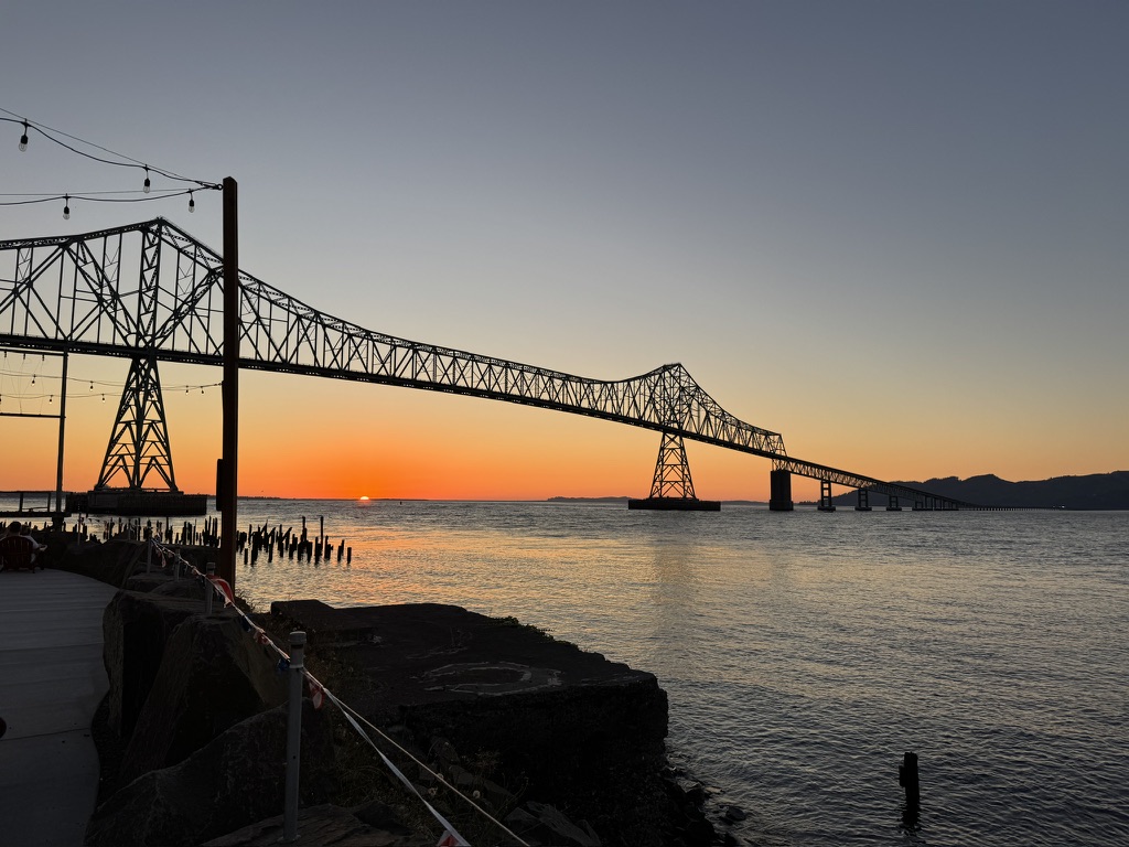 sun setting over the Astoria-Megler Bridge