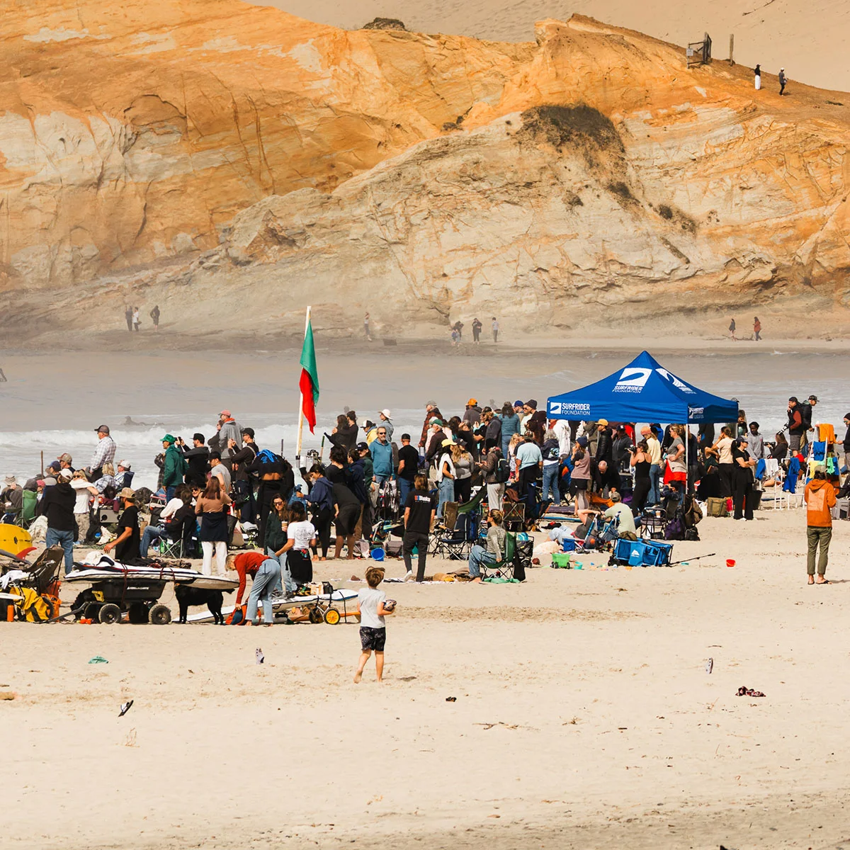 group of guests on the beach at Cape Kiwanda Longboard Classic