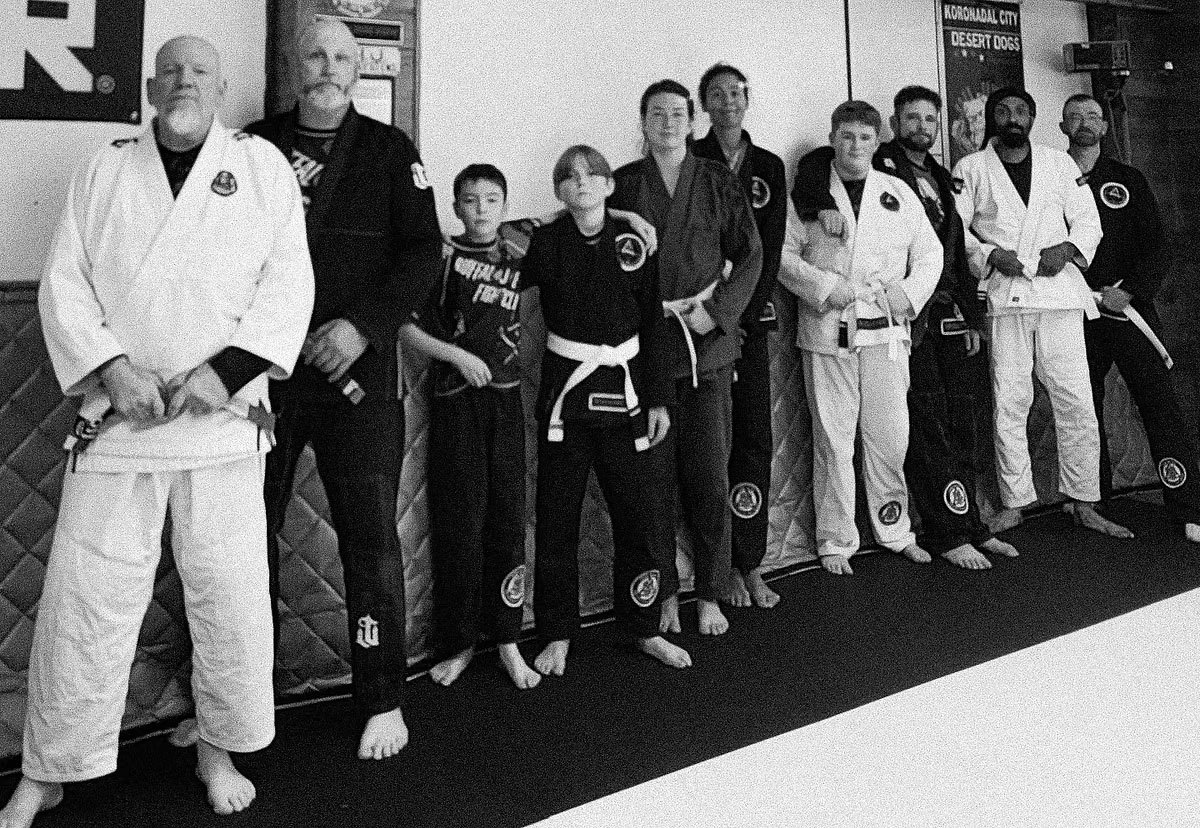 Black and white group photo at Jiu Jitsu 101 Oregon Coast