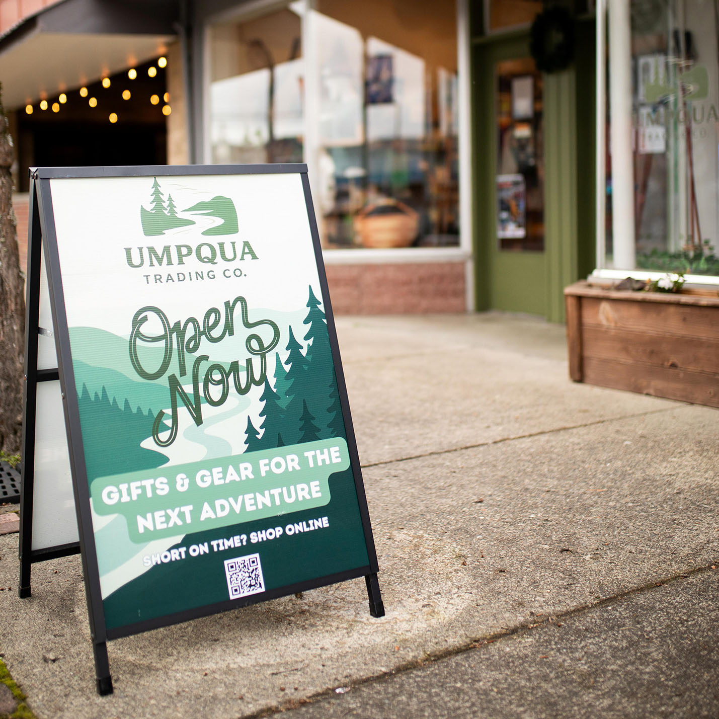 Umpqua Trading Co. open now sign