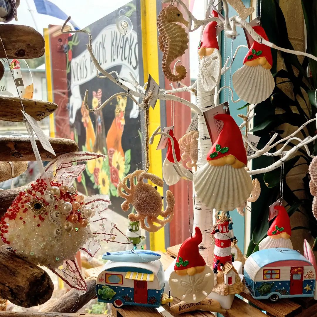 retail window display with holiday ornaments