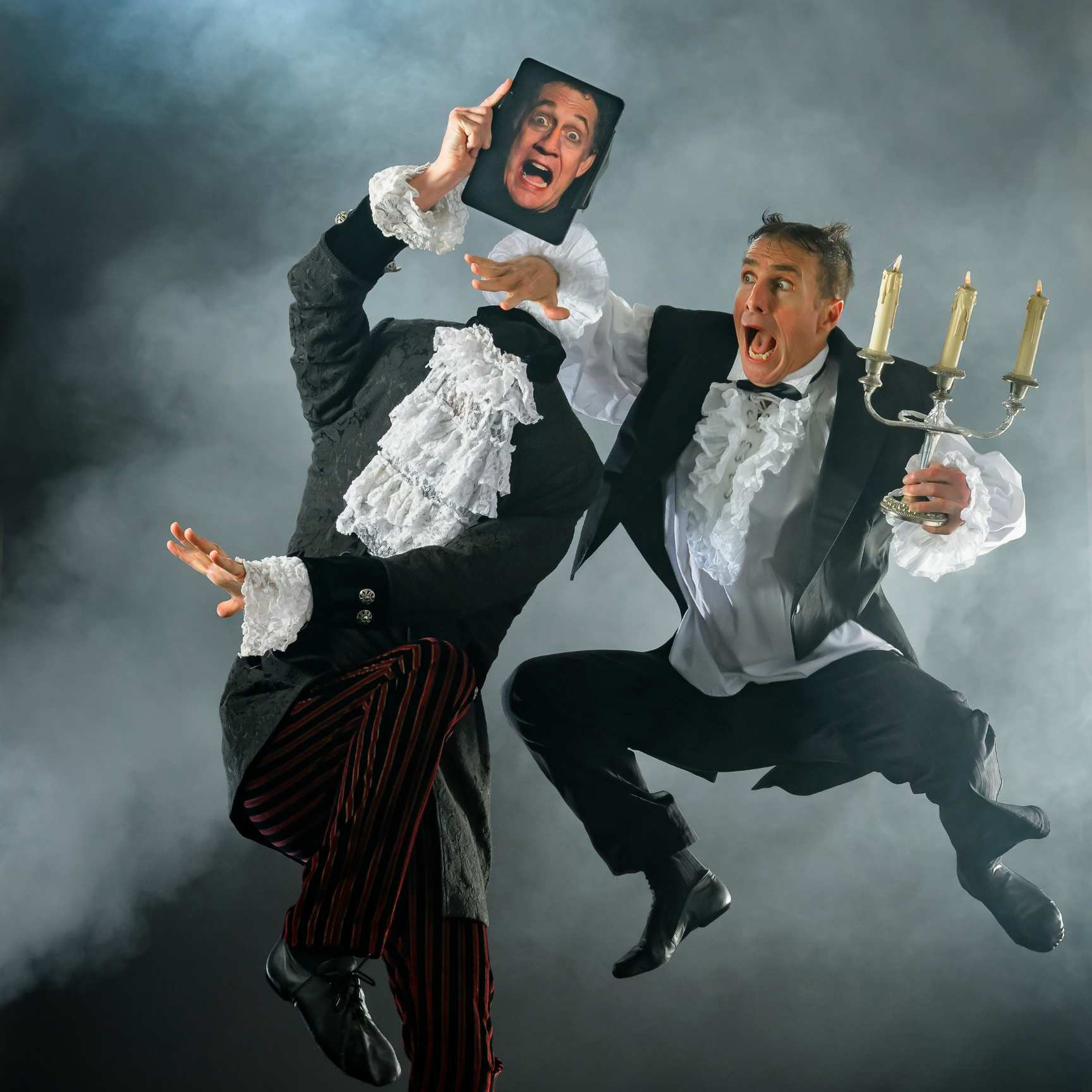 Screaming dancer in victorian outfit reaches for headless dancer in the fog