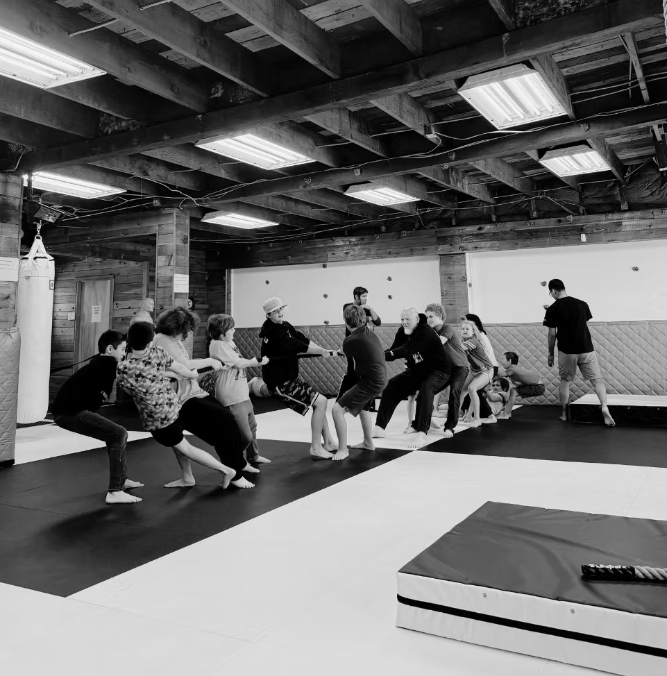 Family tug of war at Jiu Jitsu 101 dojo