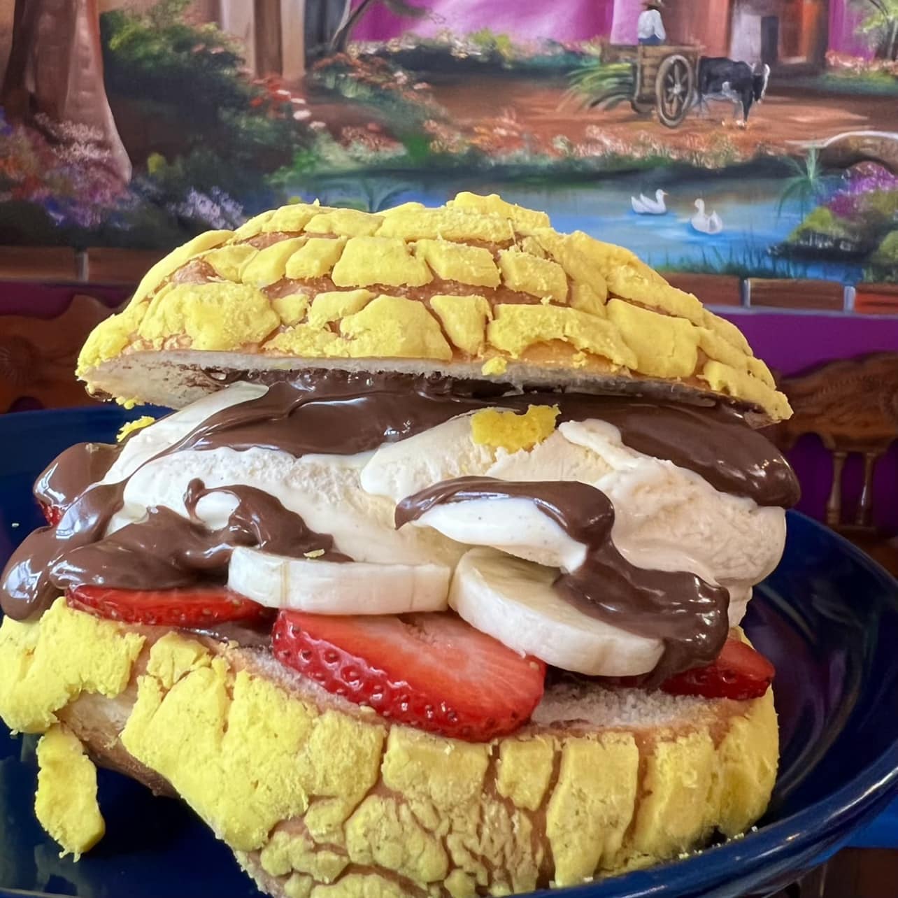concha ice cream sandwich with strawberry and banana slices