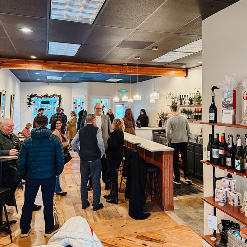 People gathered inside Vinto Tinto Wine Bar