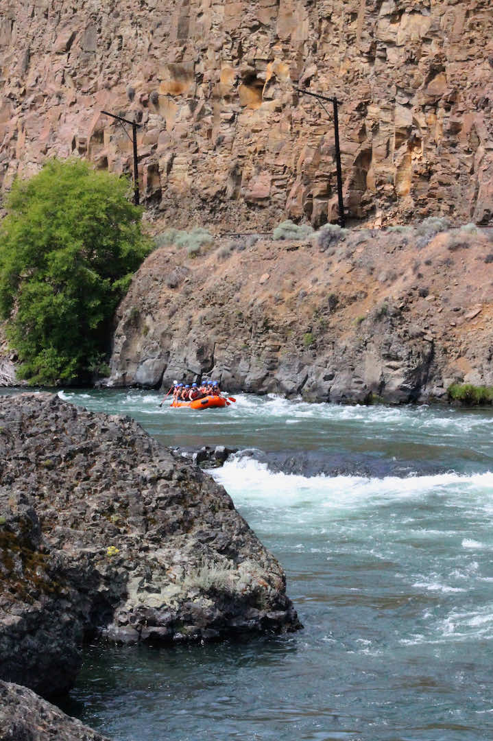 Tour group navigating the Deschutes River